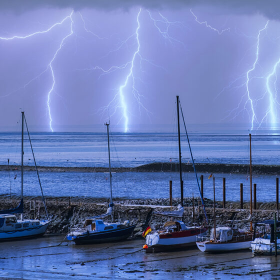 lightning striking near a marina