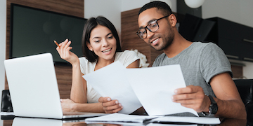 a couple discussing their personal insurance needs